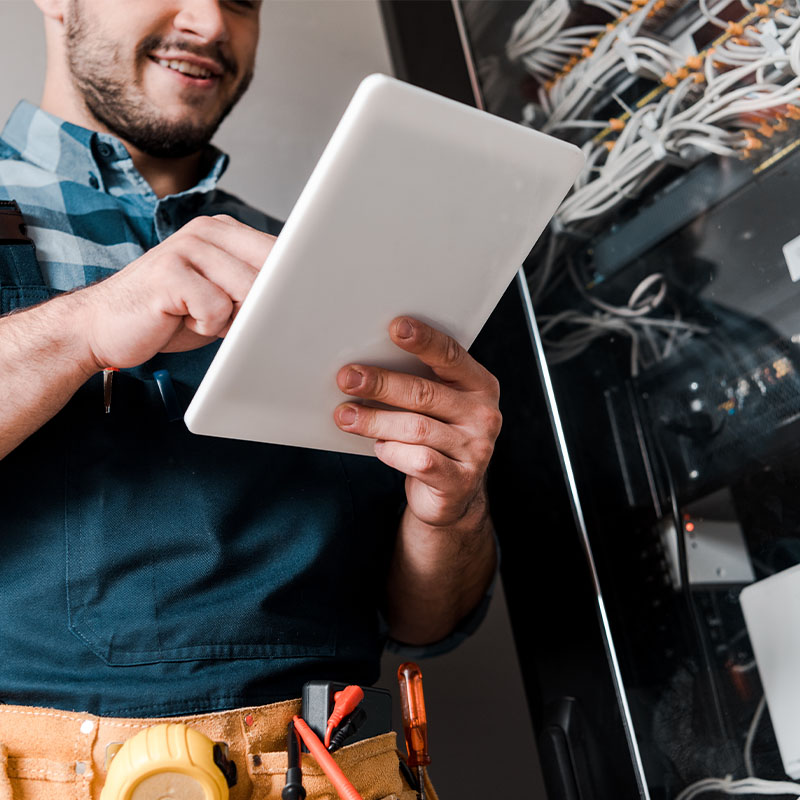 electrician using digital tablet