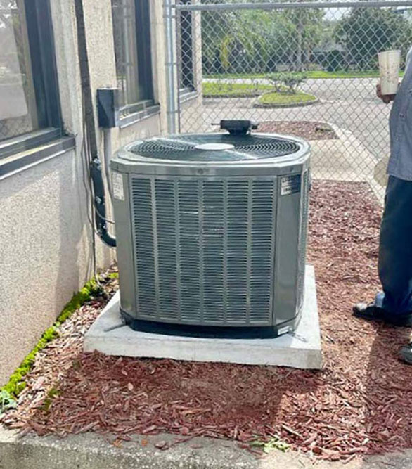 air conditioning system with technician