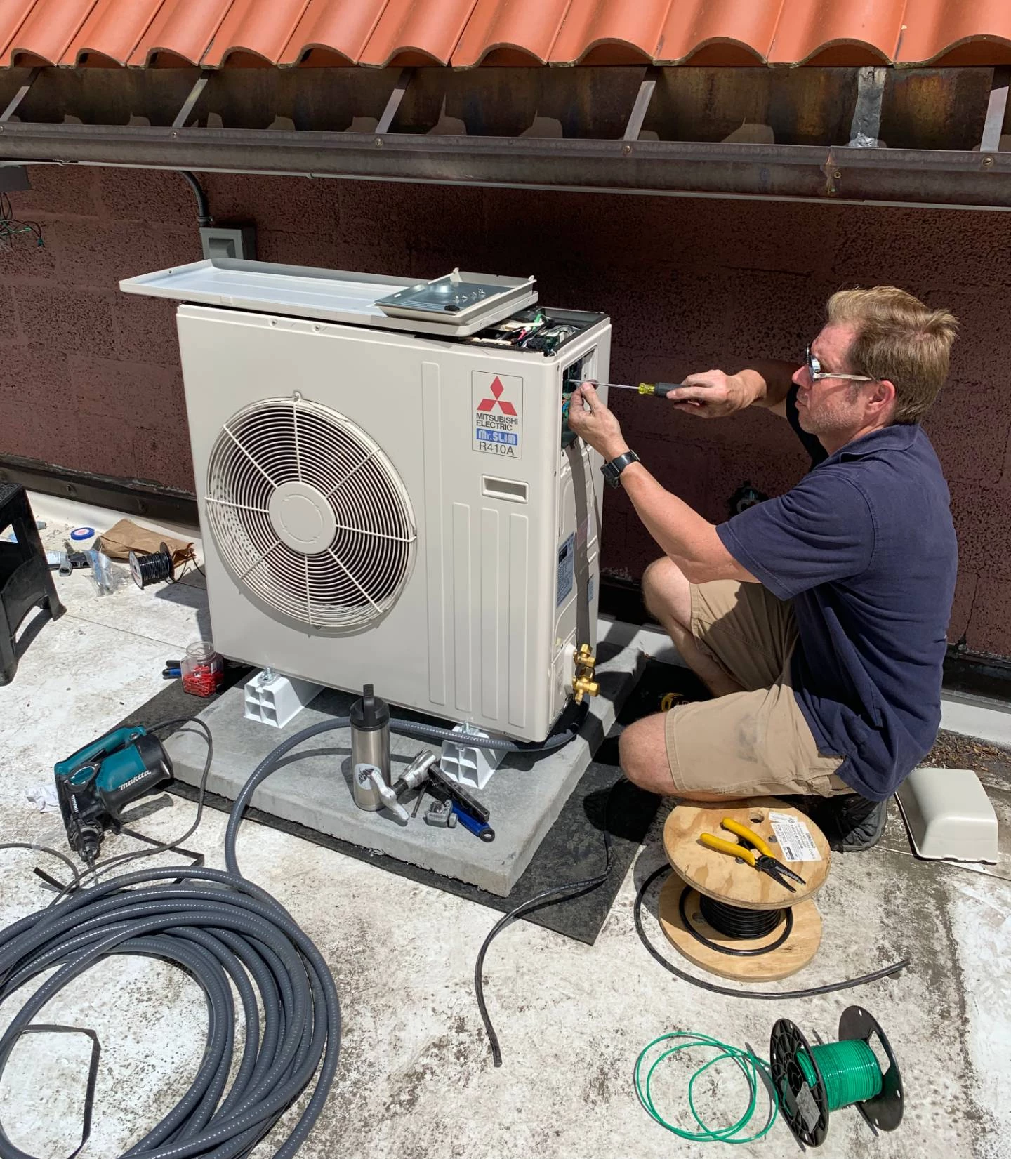 HVAC Technician installing ductless hvac